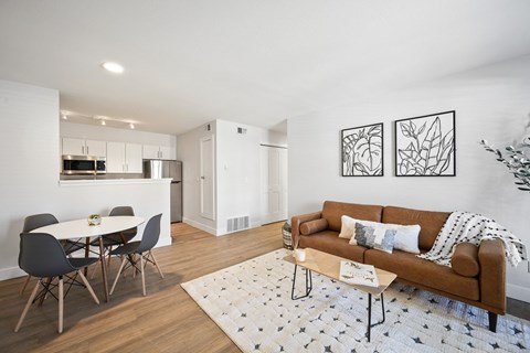 a living room with a couch and a table